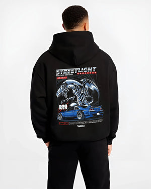 Black hoodie worn by a male model, back view, featuring Nissan GT-R gt r turbo racing drift jdm japanese street enthusiast graphic.
