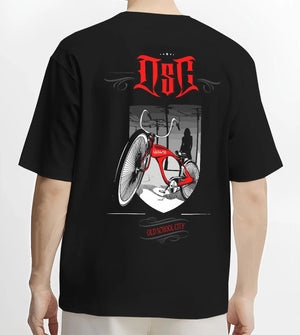 Black T-shirt worn by a male model, back view, featuring street retro racing performance motorsport automotive enthusiast osclwb.