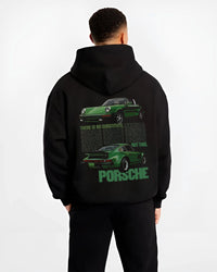 Black hoodie worn by a male model, back view, featuring Porsche 911 rs street retro vintage classic enthusiast graphic.