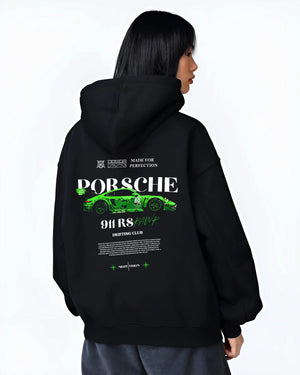 Black hoodie worn by a female model, back view, featuring Porsche 911 rs racing drift motorsport japanese street graphic.