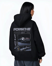 Black hoodie worn by a female model, back view, featuring Porsche 911 Turbo S rs 911 turbo racing motorsport street graphic.