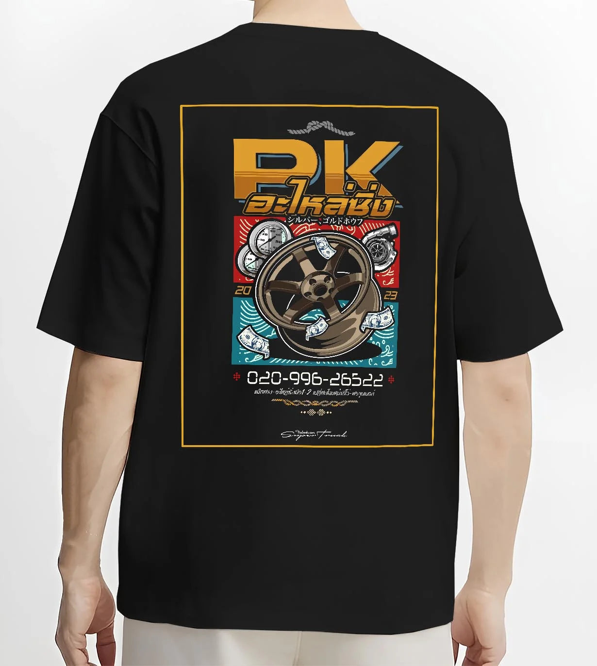 Black T-shirt worn by a male model, back view, featuring street racing performance motorsport automotive enthusiast power pkauto.