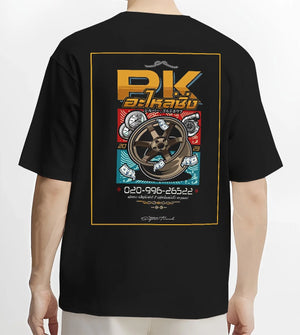 Black T-shirt worn by a male model, back view, featuring street racing performance motorsport automotive enthusiast power pkauto.