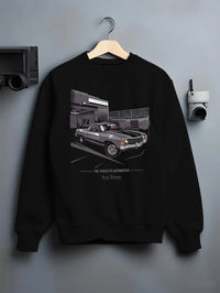 Black crewneck sweatshirt on a hanger against a grey wall, featuring CHEVROLET muscle retro classic enthusiast racing graphic.