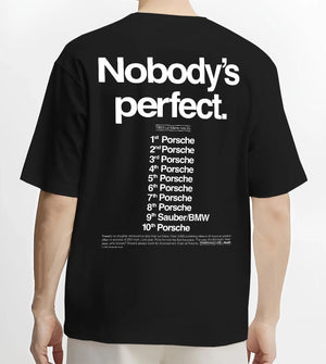 Black T-shirt worn by a male model, back view, featuring Porsche rs racing le mans motorsport street performance automotive graphic.