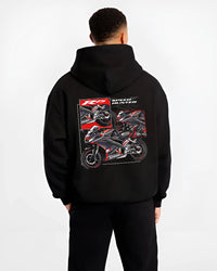 Black hoodie worn by a male model, back view, featuring Yamaha R1 racing street speed performance motorsport automotive graphic.
