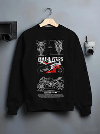 Black crewneck sweatshirt on a hanger against a grey wall, featuring Yamaha R6 racing street enthusiast performance graphic.