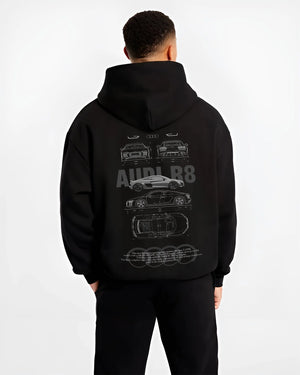 Black hoodie worn by a male model, back view, featuring Audi R8 v10 racing german street performance motorsport graphic.