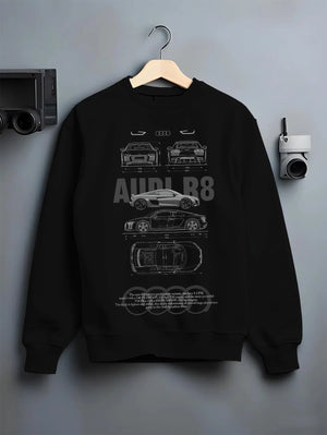 Black crewneck sweatshirt on a hanger against a grey wall, featuring Audi R8 v10 racing german street performance graphic.