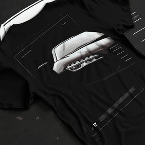 Black T-shirt laid flat with natural fabric folds, featuring Audi R8 turbo v10 racing german street performance graphic.