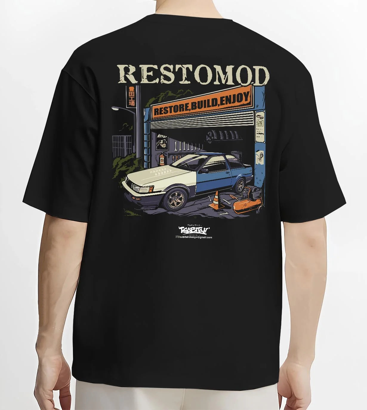 Black T-shirt worn by a male model, back view, featuring Toyota AE86 drift jdm tuner street racing performance graphic.