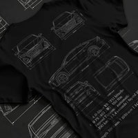Black T-shirt laid flat with natural fabric folds, featuring Audi RS7 rs turbo racing german street performance graphic.
