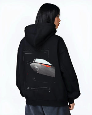 Black hoodie worn by a female model, back view, featuring Lamborghini racing street enthusiast performance motorsport graphic.