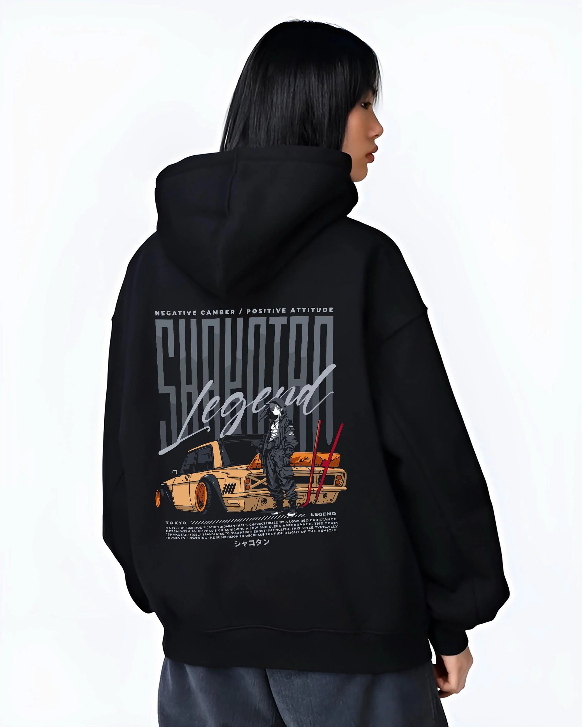 Black hoodie worn by a female model, back view, featuring Toyota jdm stance legend racing street performance motorsport graphic.