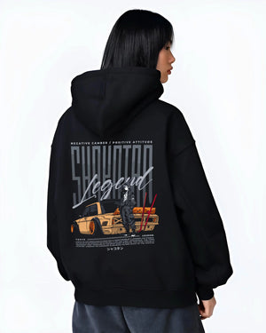 Black hoodie worn by a female model, back view, featuring Toyota jdm stance legend racing street performance motorsport graphic.