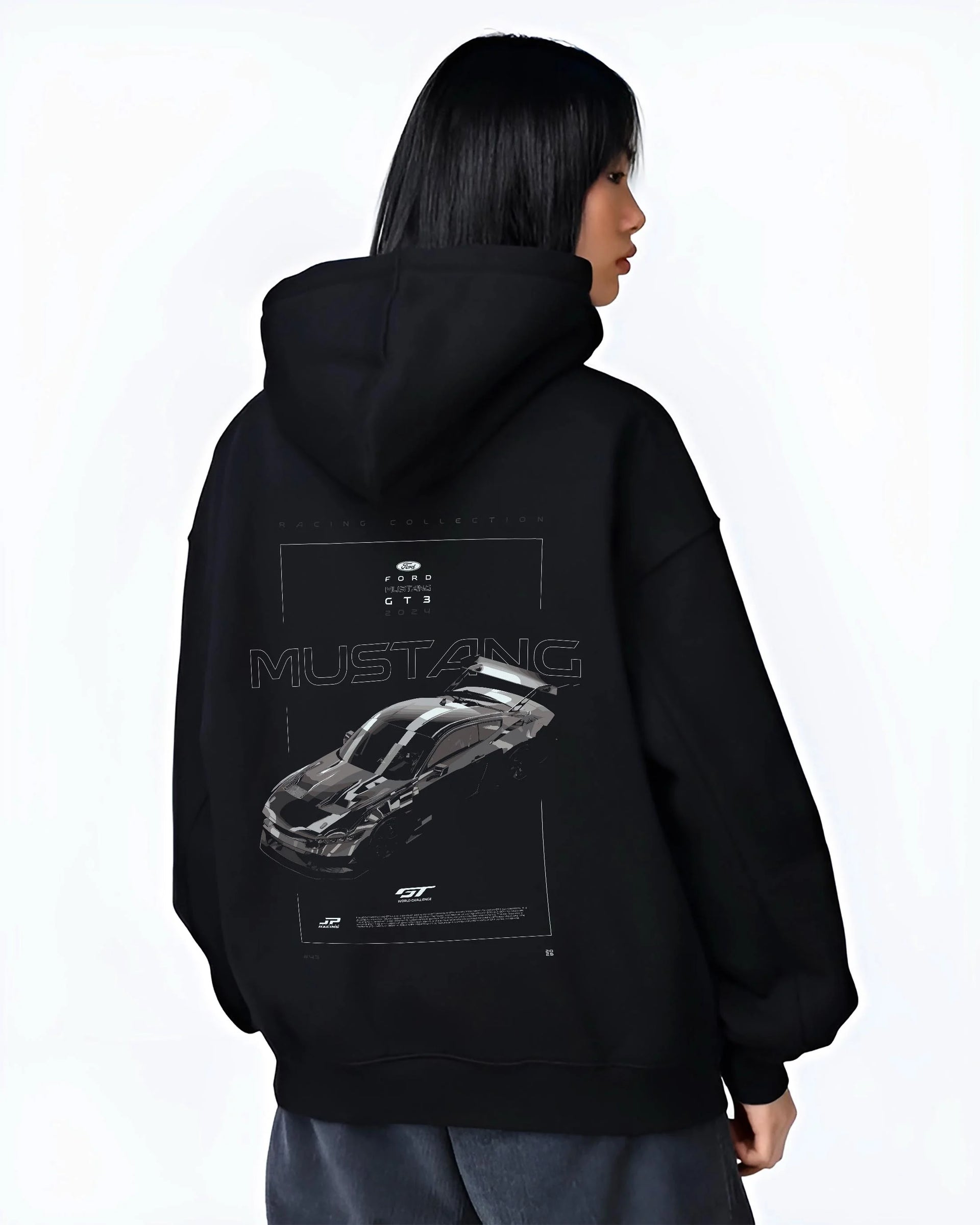 Black hoodie worn by a female model, back view, featuring shelby turbo turbocharged racing american muscle street classic graphic.