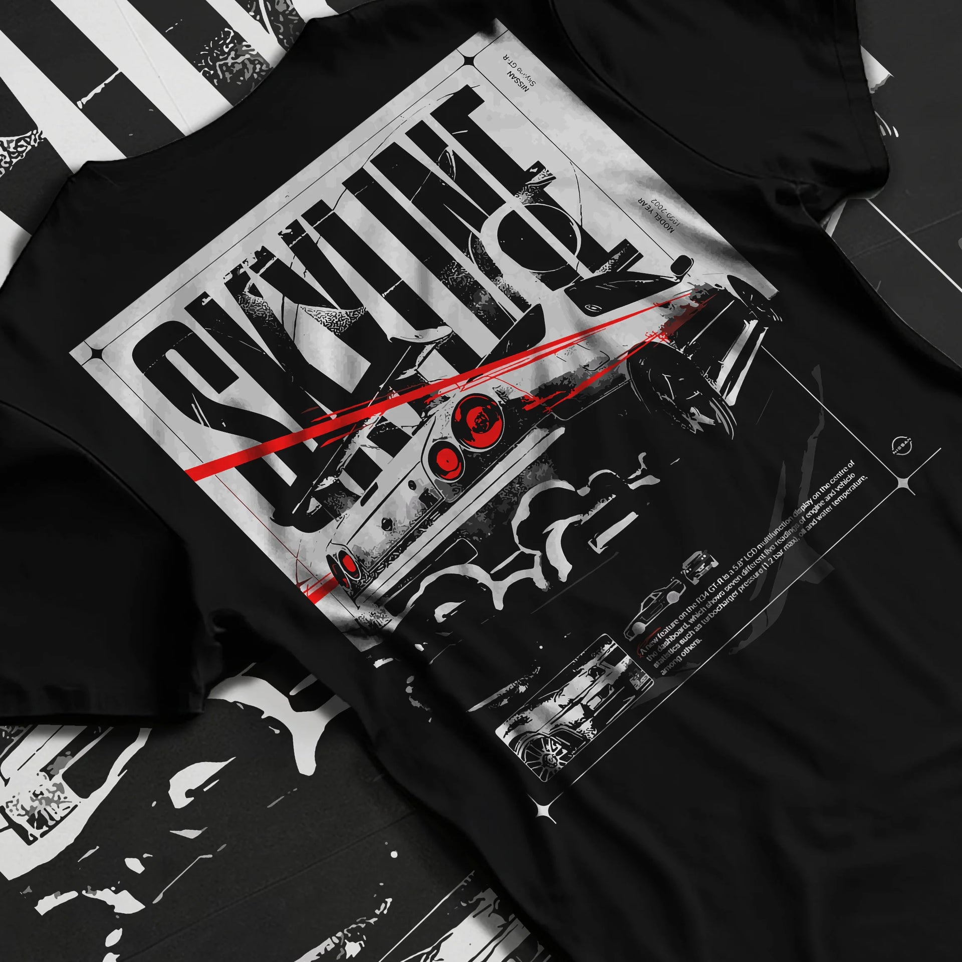 Black T-shirt laid flat with natural fabric folds, featuring Nissan Skyline R34 r34 skyline turbo turbocharged racing jdm graphic.