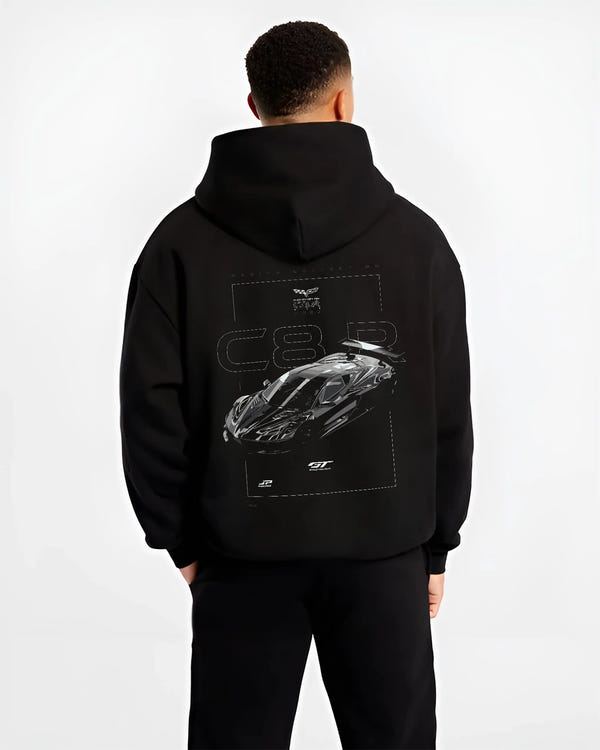 Black hoodie worn by a male model, back view, featuring Chevrolet Corvette C6 corvette racing muscle street enthusiast graphic.