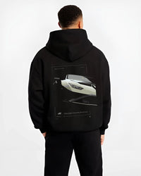 Black hoodie worn by a male model, back view, featuring rs turbo racing track street enthusiast performance motorsport graphic.