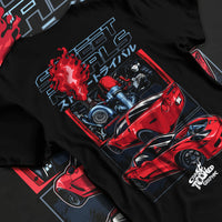 Black T-shirt laid flat with natural fabric folds, featuring Chevrolet Corvette turbo ls racing street performance graphic.