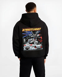 Black hoodie worn by a male model, back view, featuring SKYLINE r34 racing drift jdm japanese street performance graphic.