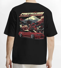 Black T-shirt worn by a male model, back view, featuring SKYLINE r32 drift jdm street retro racing performance graphic.
