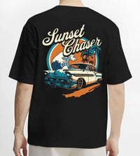 Black T-shirt worn by a male model, back view, featuring Chevrolet classic racing street performance motorsport automotive graphic.