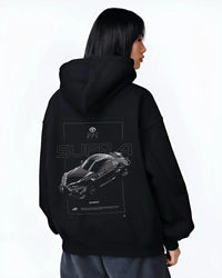 Black hoodie worn by a female model, back view, featuring Toyota Supra turbo turbocharged racing drift jdm tuner widebody graphic.