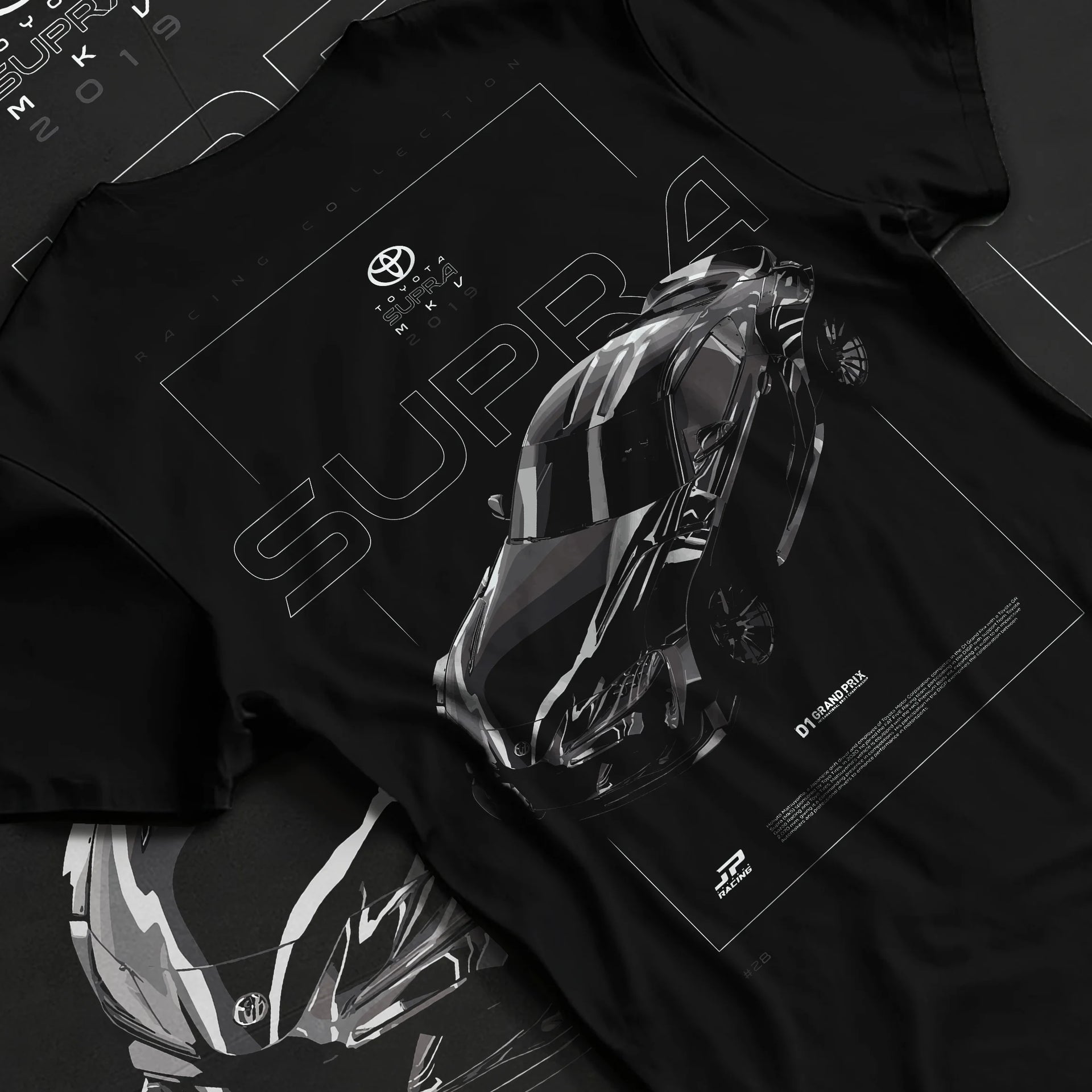Black T-shirt laid flat with natural fabric folds, featuring Toyota Supra turbo turbocharged racing drift jdm tuner graphic.