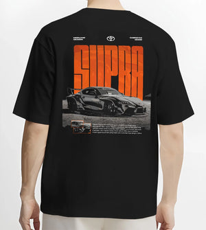 Black T-shirt worn by a male model, back view, featuring Toyota Supra turbo racing drift jdm japanese tuner street graphic.