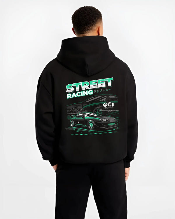 Black hoodie worn by a male model, back view, featuring Toyota Supra turbo jdm street racing performance motorsport graphic.