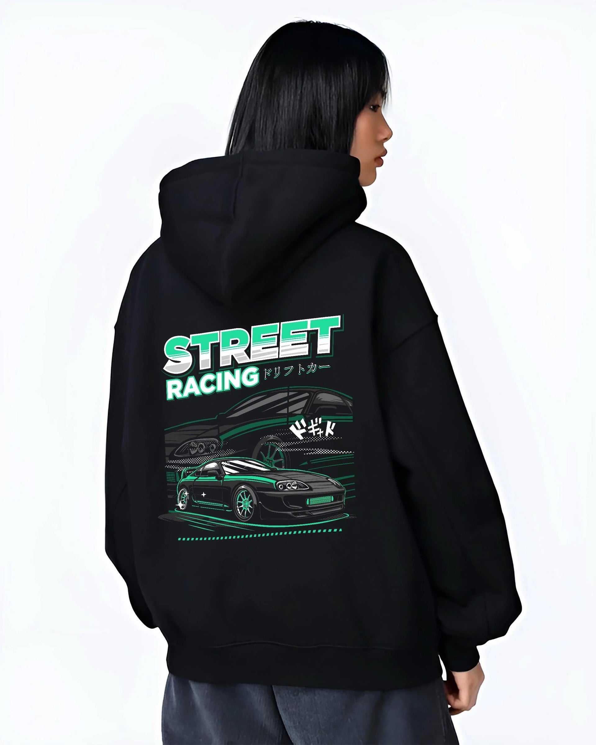 Black hoodie worn by a female model, back view, featuring Toyota Supra turbo jdm street racing performance motorsport graphic.
