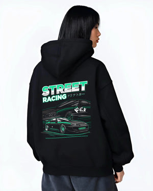 Black hoodie worn by a female model, back view, featuring Toyota Supra turbo jdm street racing performance motorsport graphic.