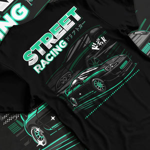 Black T-shirt laid flat with natural fabric folds, featuring Toyota Supra turbo jdm street racing performance motorsport graphic.