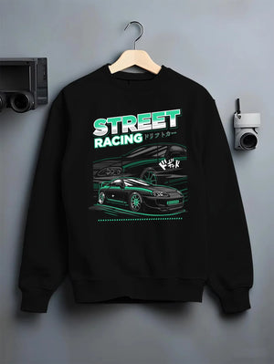 Black crewneck sweatshirt on a hanger against a grey wall, featuring Toyota Supra turbo jdm street racing performance graphic.