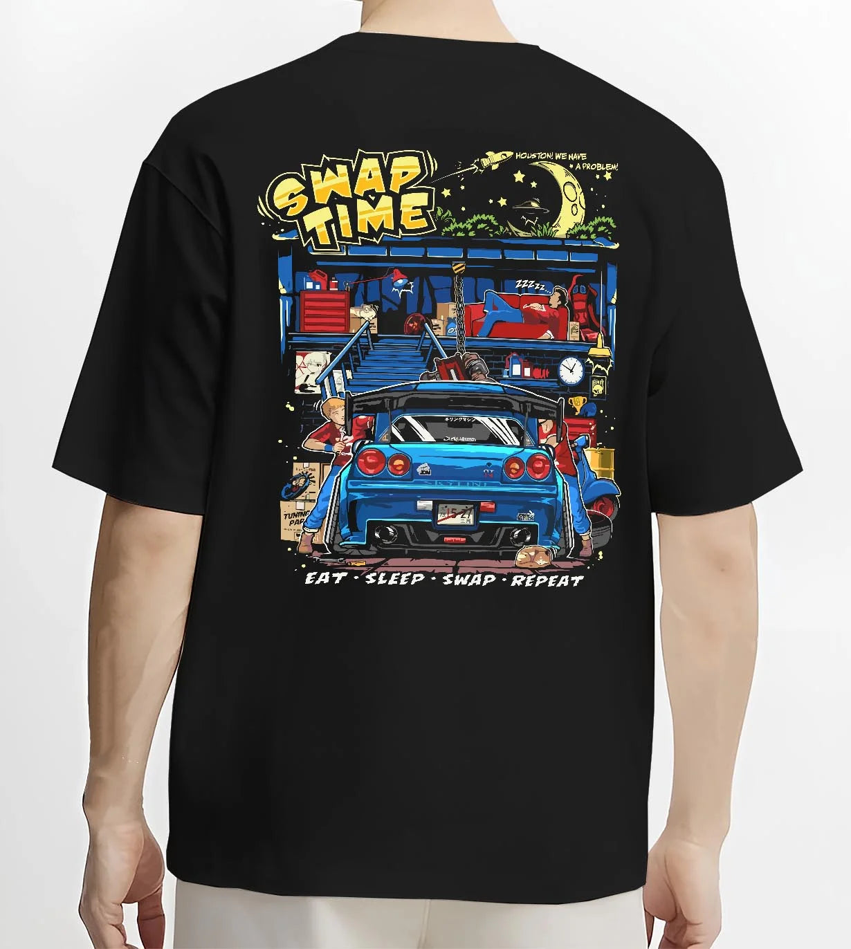 Black T-shirt worn by a male model, back view, featuring Nissan Skyline R34 r34 skyline racing drift jdm tuner street graphic.