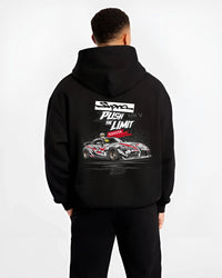 Black hoodie worn by a male model, back view, featuring Toyota Supra MK4 supra turbo turbocharged racing drift jdm tuner graphic.