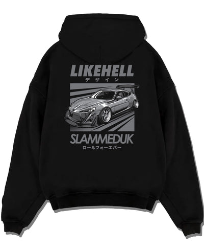 Black pullover hoodie laid flat on a white background, featuring Toyota 86 drift slammed street racing performance graphic.