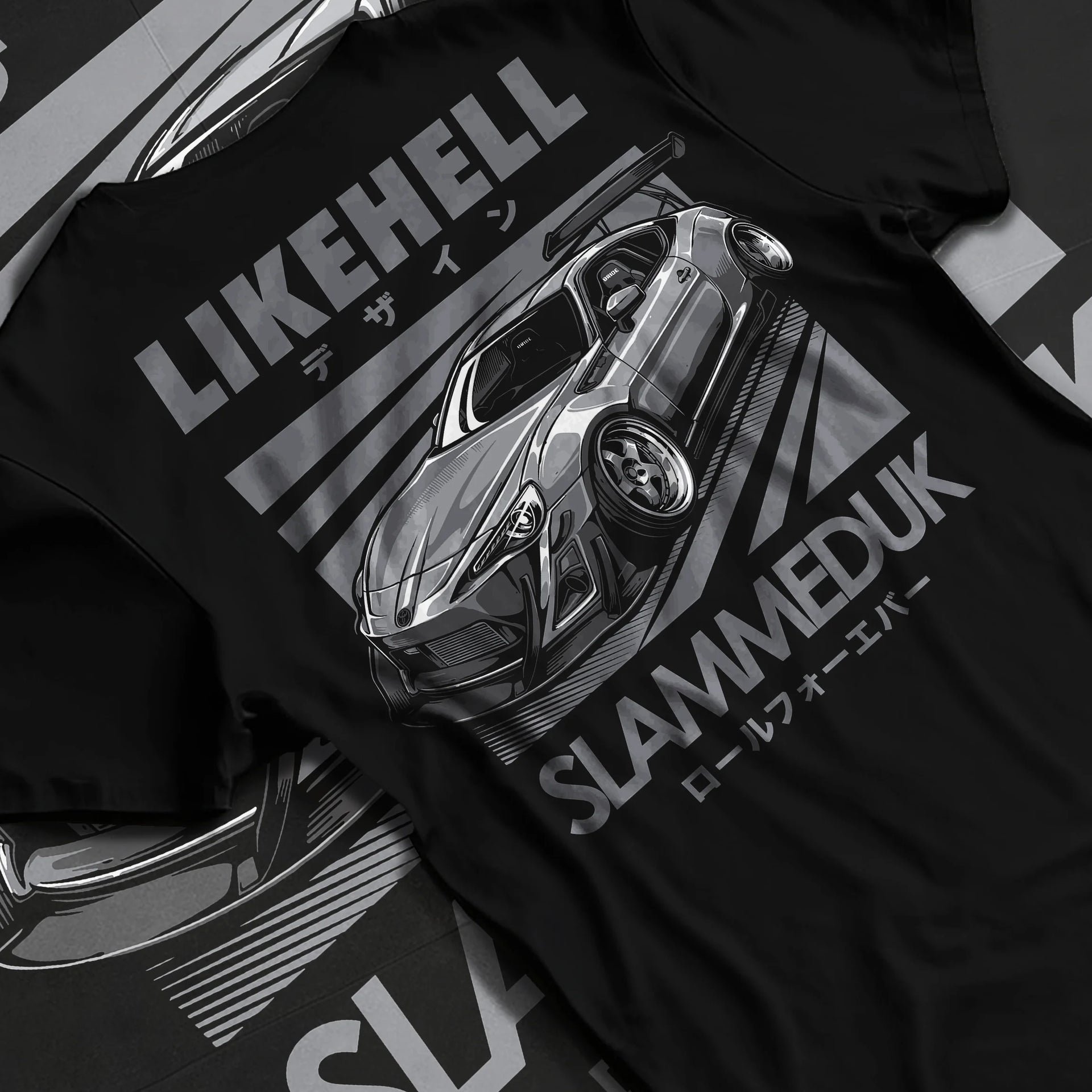 Black T-shirt laid flat with natural fabric folds, featuring Toyota 86 drift slammed street racing performance motorsport graphic.