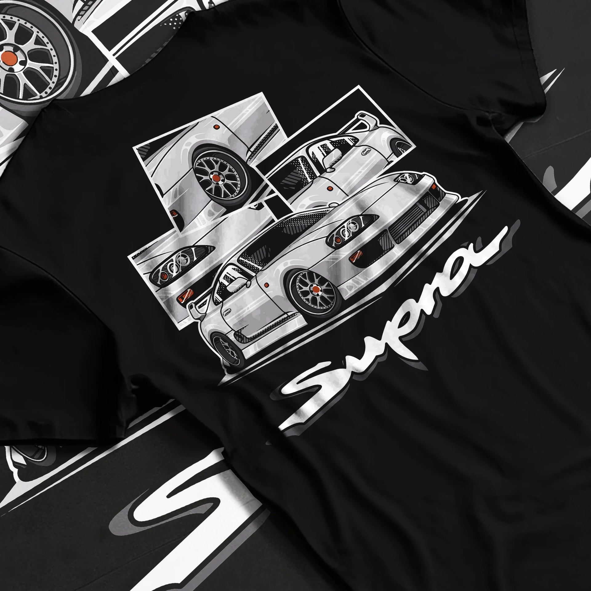 Black T-shirt laid flat with natural fabric folds, featuring Toyota Supra turbo turbocharged jdm street classic racing graphic.