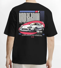 Black T-shirt worn by a male model, back view, featuring Toyota Supra drift tokyo underground tokyo drift racing street graphic.