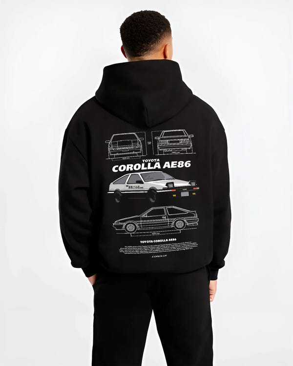 Black hoodie worn by a male model, back view, featuring Toyota AE86 drift legend racing street performance motorsport graphic.