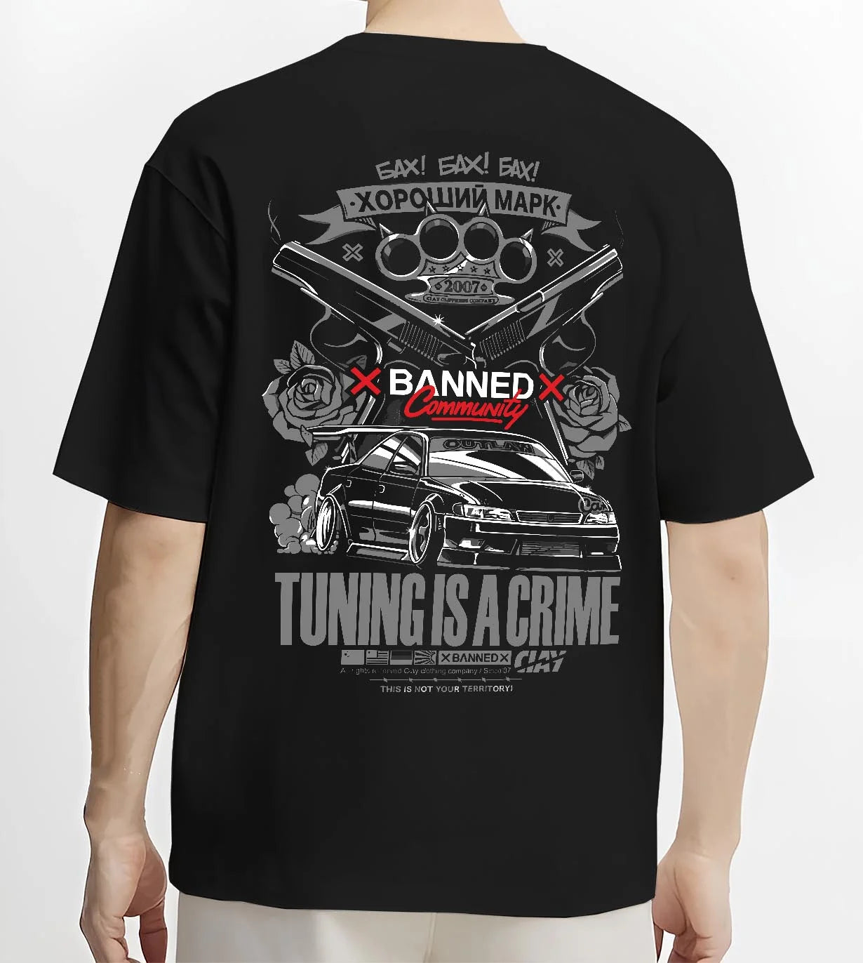 Black T-shirt worn by a male model, back view, featuring Toyota Supra JZA80 supra turbo racing drift jdm stance widebody graphic.