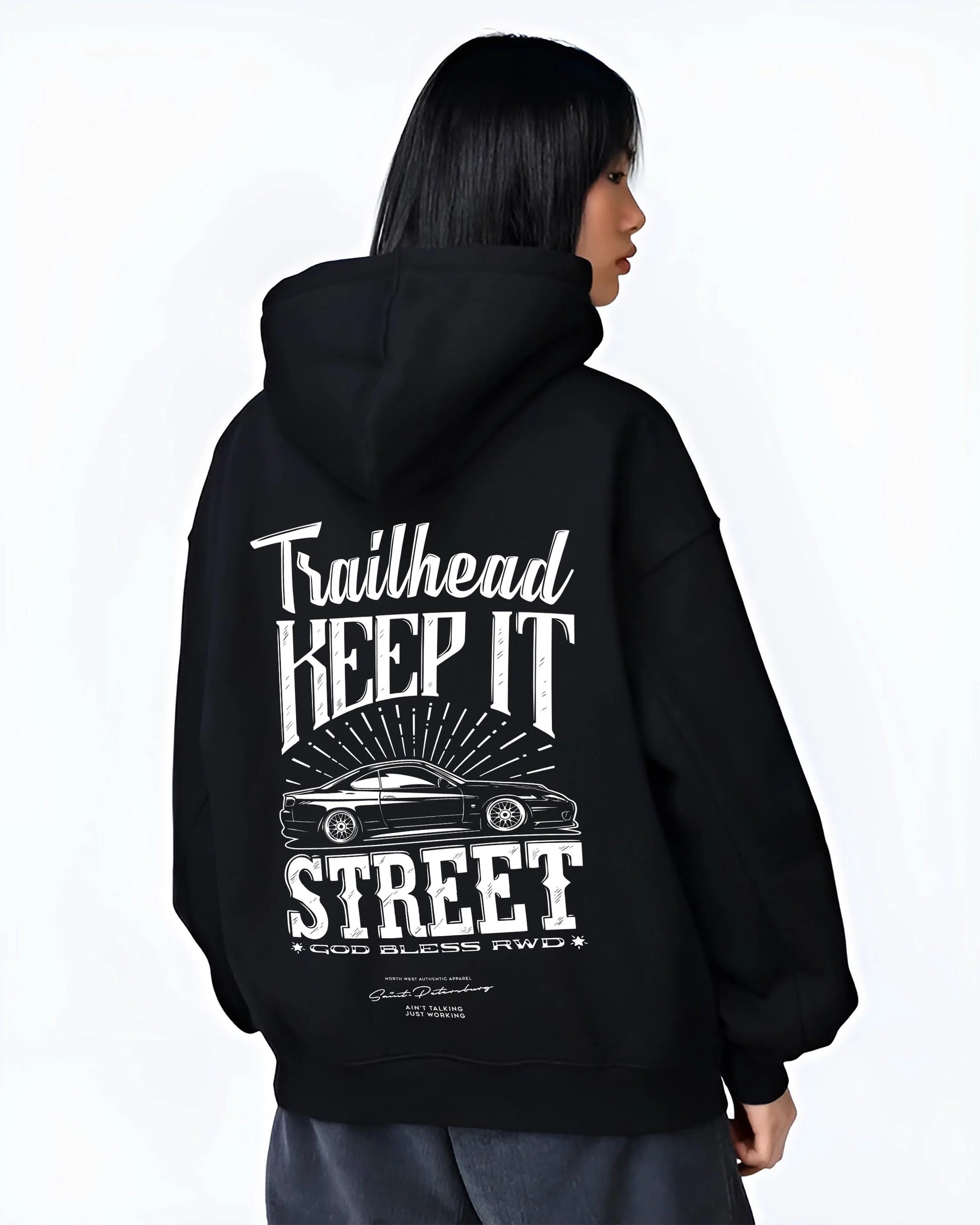 Black hoodie worn by a female model, back view, featuring rs racing race street enthusiast performance motorsport graphic.