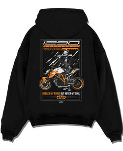 Black pullover hoodie laid flat on a white background, featuring KTM racing street beast performance motorsport automotive graphic.