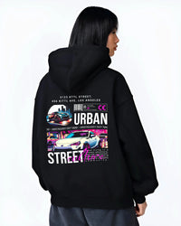 Black hoodie worn by a female model, back view, featuring racing japanese street retro performance motorsport automotive graphic.