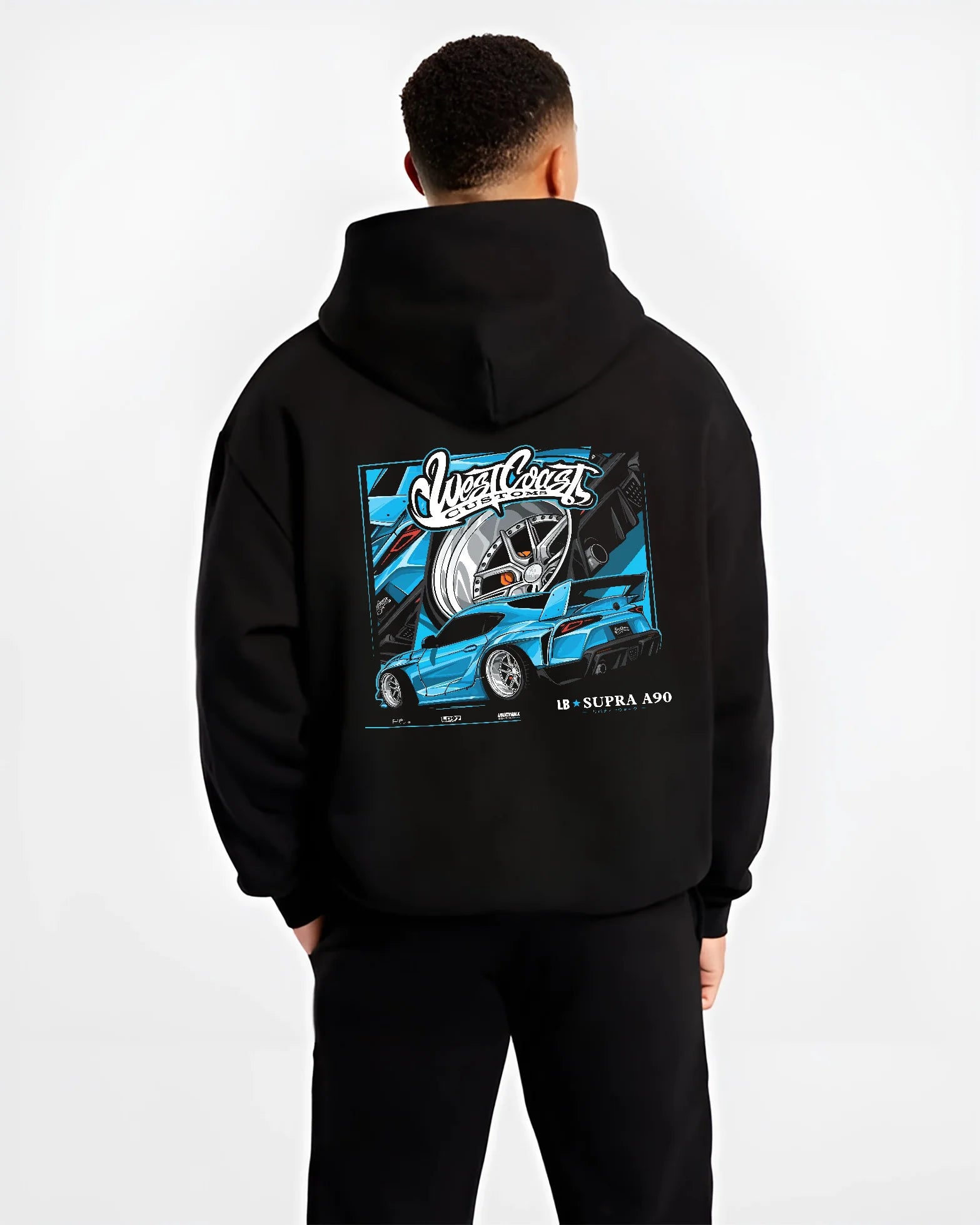 Black hoodie worn by a male model, back view, featuring Toyota Supra racing jdm tuning street enthusiast performance graphic.