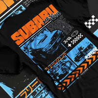 Black T-shirt laid flat with natural fabric folds, featuring Subaru WRX STI sti wrx turbo racing drift rally jdm japanese graphic.
