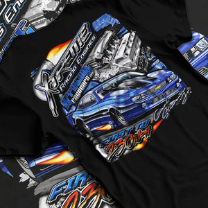 Black T-shirt laid flat with natural fabric folds, featuring turbo racing drag jdm muscle street performance motorsport graphic.