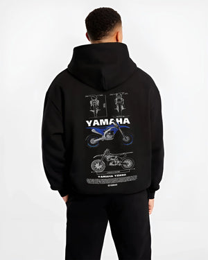 Black hoodie worn by a male model, back view, featuring Yamaha YZ250 racing street enthusiast performance motorsport graphic.